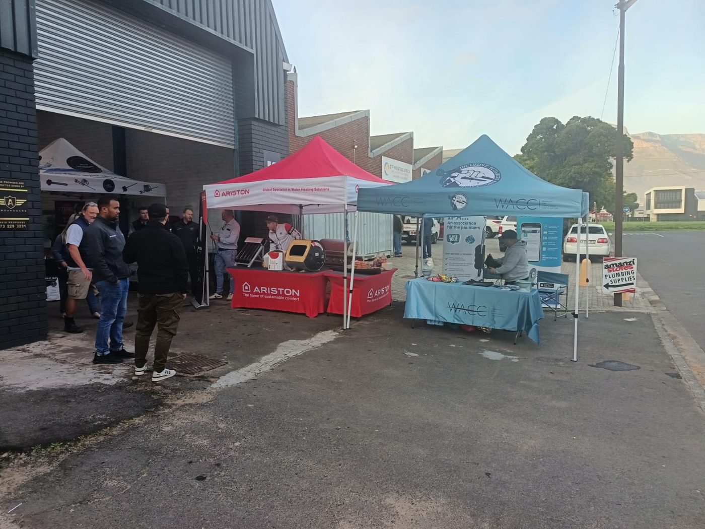Plumbers between the IPA stand and the suppliers at a trade day